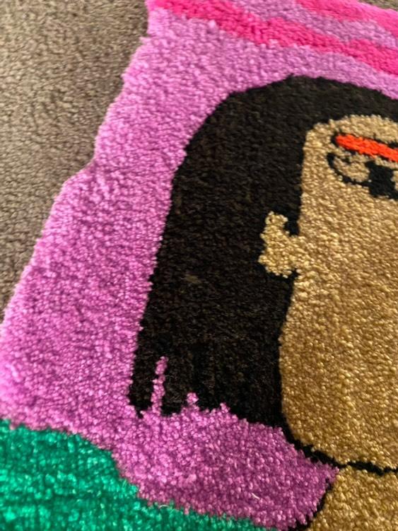 Indigenous woman rug